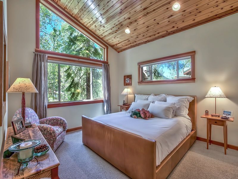 1018 Snow Crest Road Alpine Meadows, CA 96146 - Photo 8 of 14 a bedroom with furniture and a large window