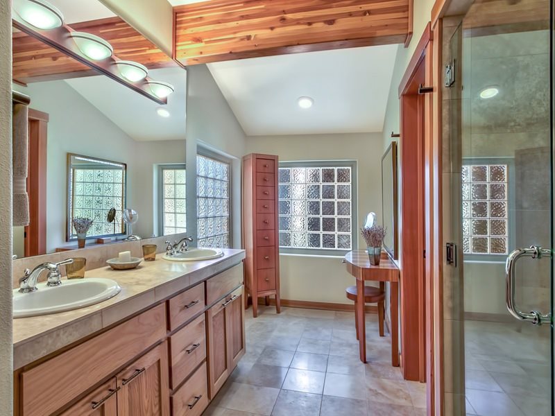 1018 Snow Crest Road Alpine Meadows, CA 96146 - Photo 9 of 14 a bathroom with a granite countertop sink and mirror