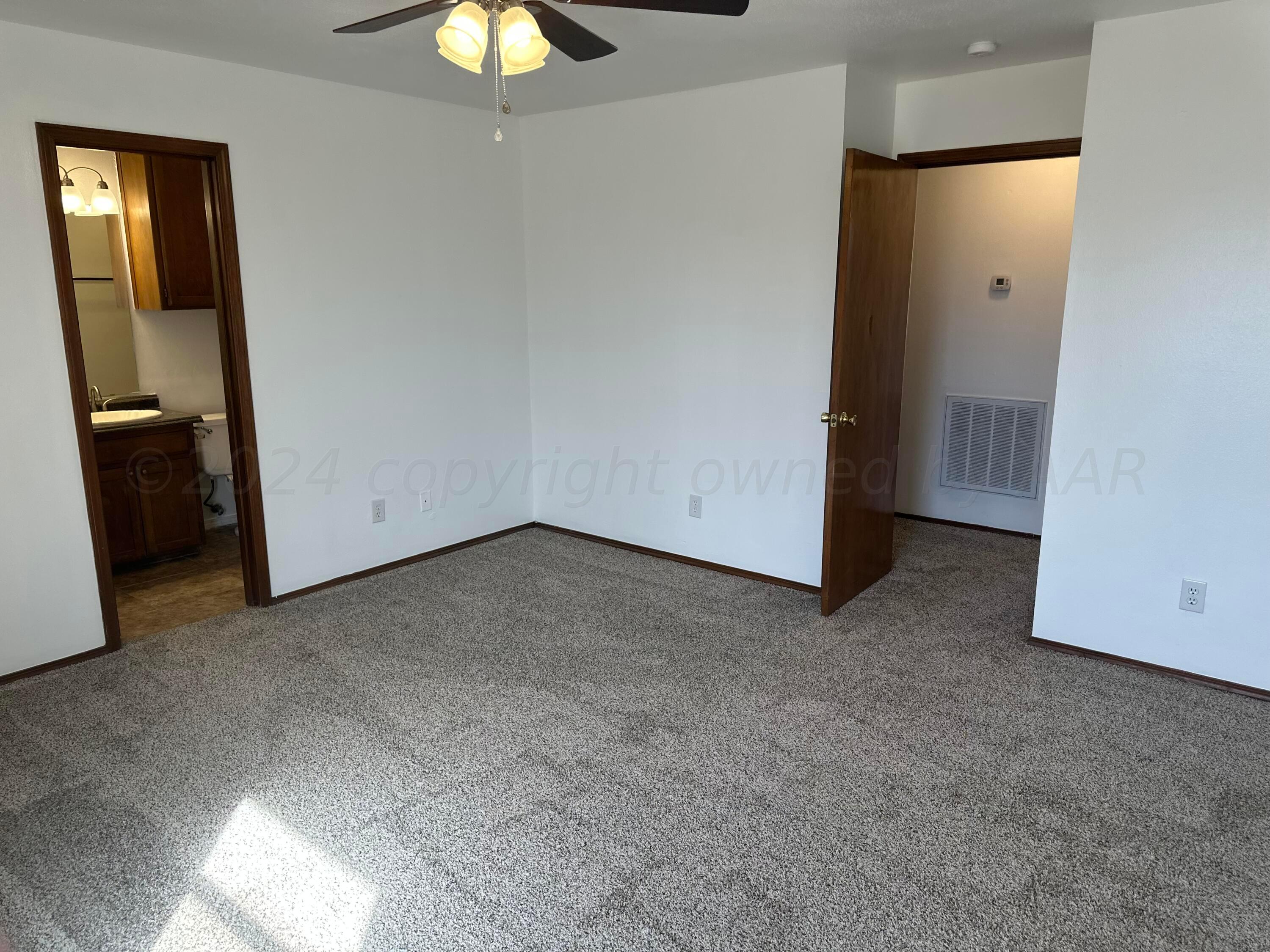 4225 Jamie Trail Amarillo, TX 79110 - Photo 8 of 15 an empty room with a fan