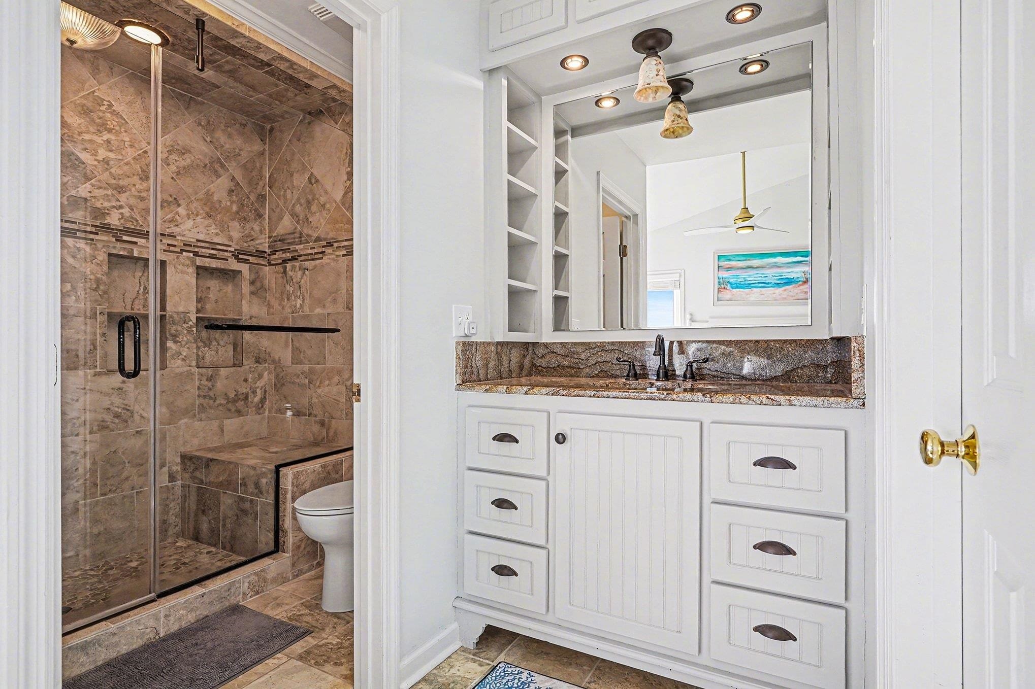 4999 Highway 17 Business, Unit 304D Murrells Inlet, SC 29576 - Photo 19 of 33 Bathroom featuring vanity and a stall shower