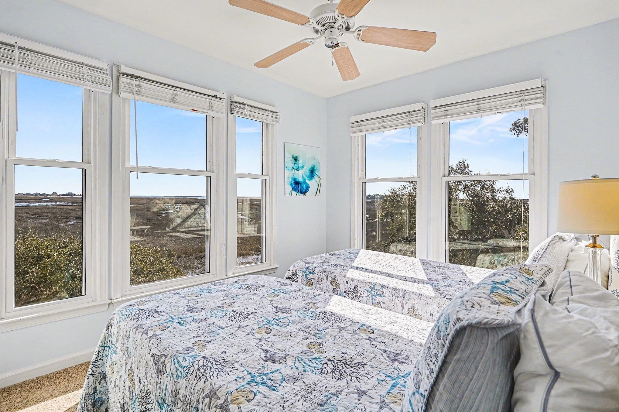 4999 Highway 17 Business, Unit 304D Murrells Inlet, SC 29576 - Photo 21 of 33 Carpeted bedroom featuring a ceiling fan