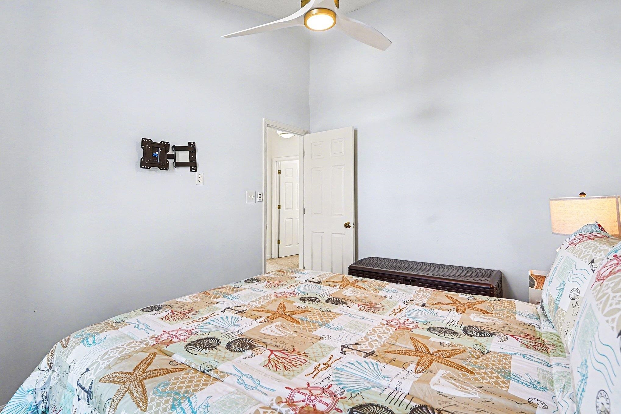 4999 Highway 17 Business, Unit 304D Murrells Inlet, SC 29576 - Photo 22 of 33 Bedroom with a towering ceiling and a ceiling fan