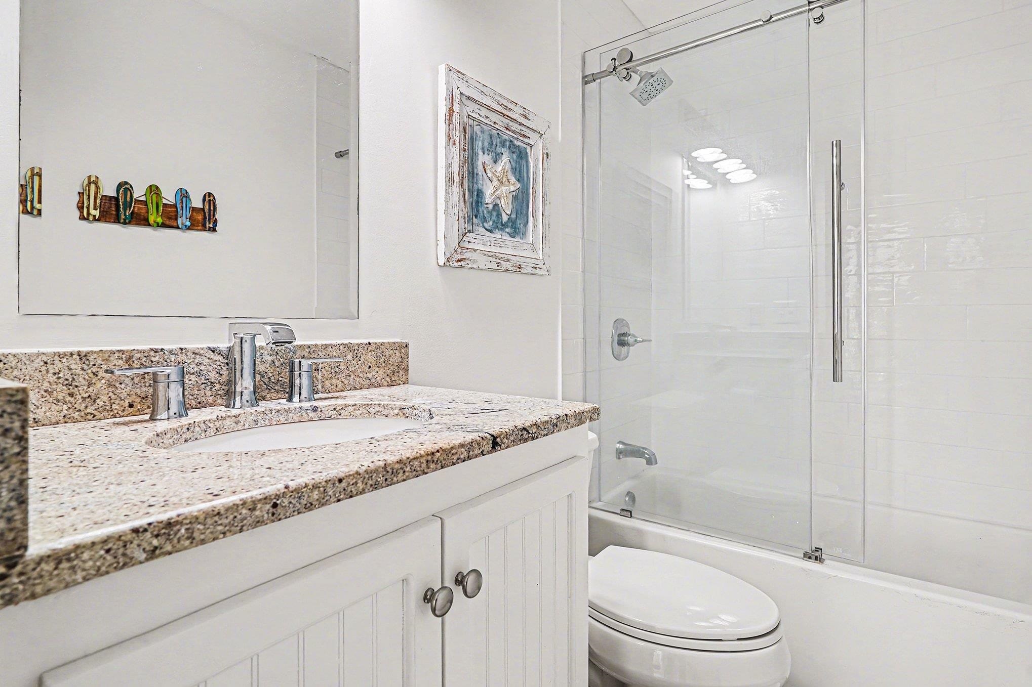 4999 Highway 17 Business, Unit 304D Murrells Inlet, SC 29576 - Photo 24 of 33 Bathroom with vanity and combined bath / shower with glass door