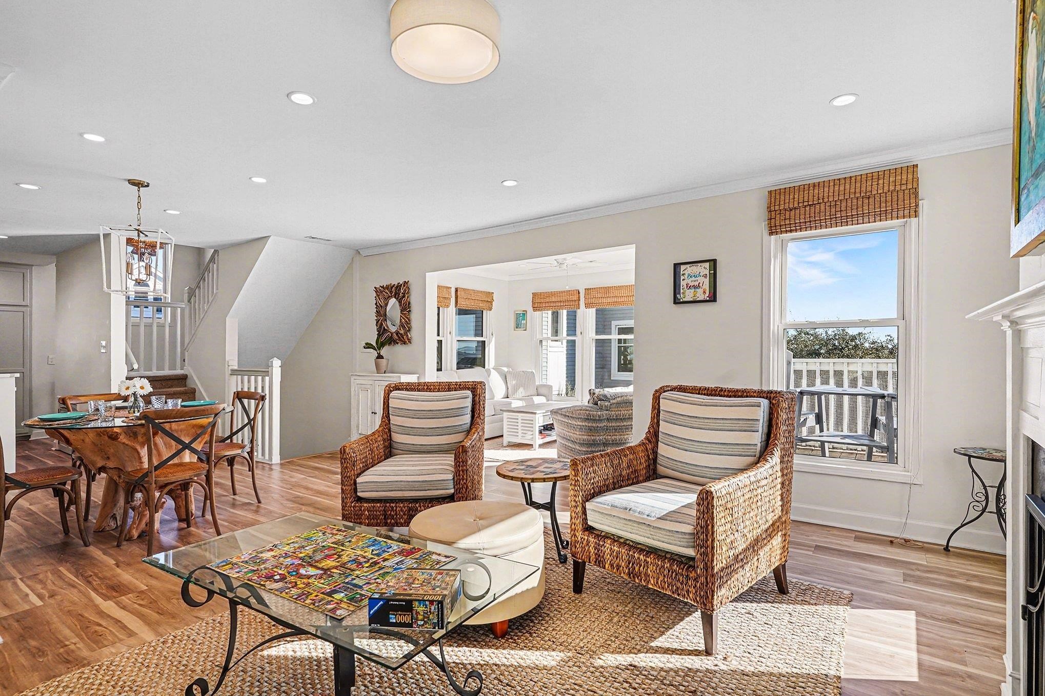 4999 Highway 17 Business, Unit 304D Murrells Inlet, SC 29576 - Photo 6 of 33 Living area with light wood-style floors, recessed lighting, a fireplace, ornamental molding, and stairs