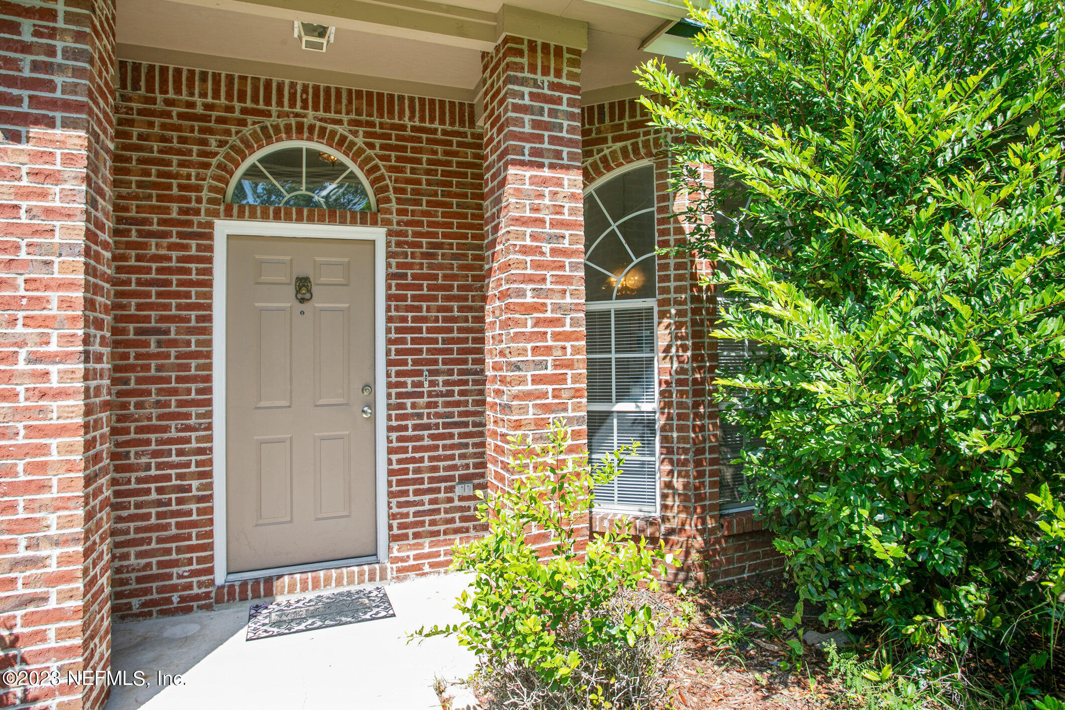 6650 Ricker Road Jacksonville, FL 32244 - Photo 1 of 41 a front view of a house with a garden