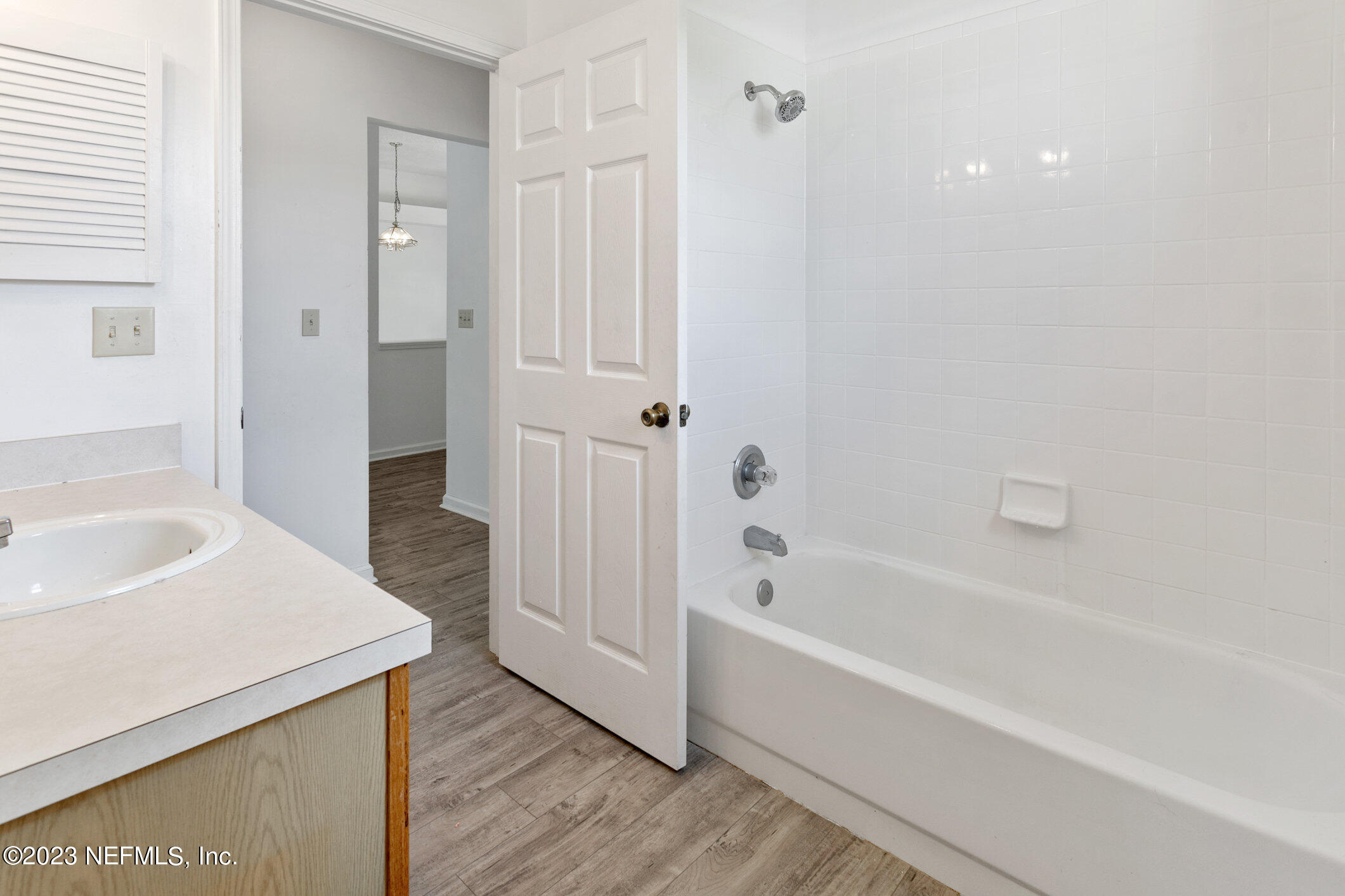 6650 Ricker Road Jacksonville, FL 32244 - Photo 19 of 41 a bathroom with a bathtub and a sink