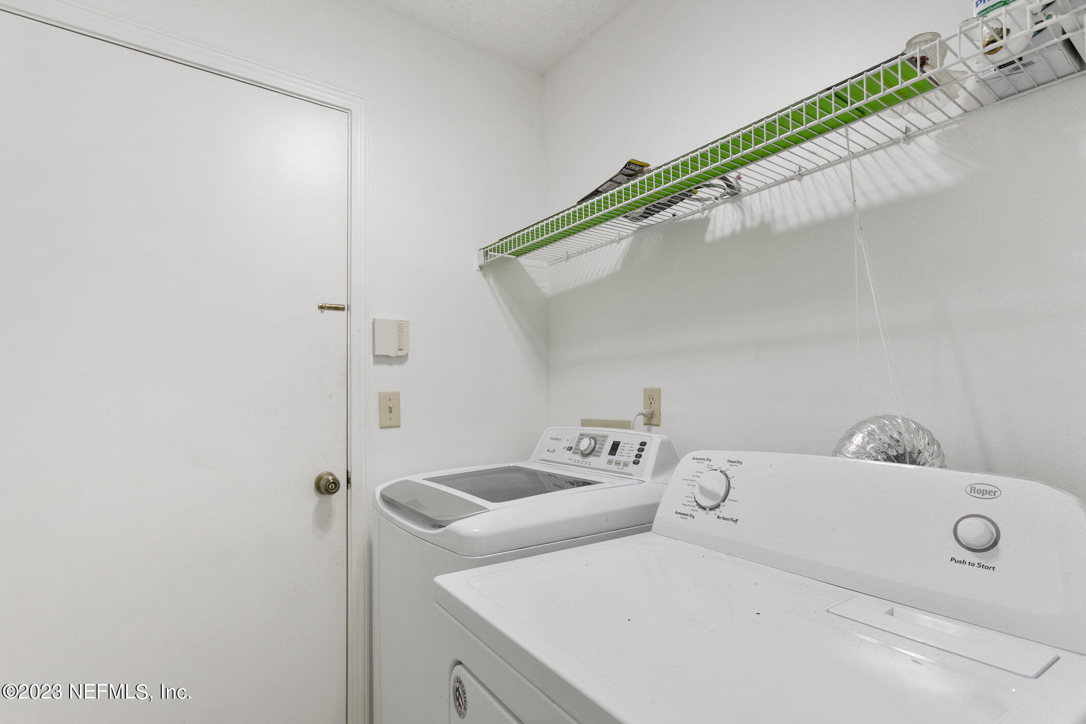 6650 Ricker Road Jacksonville, FL 32244 - Photo 32 of 41 a utility room with dryer and washer