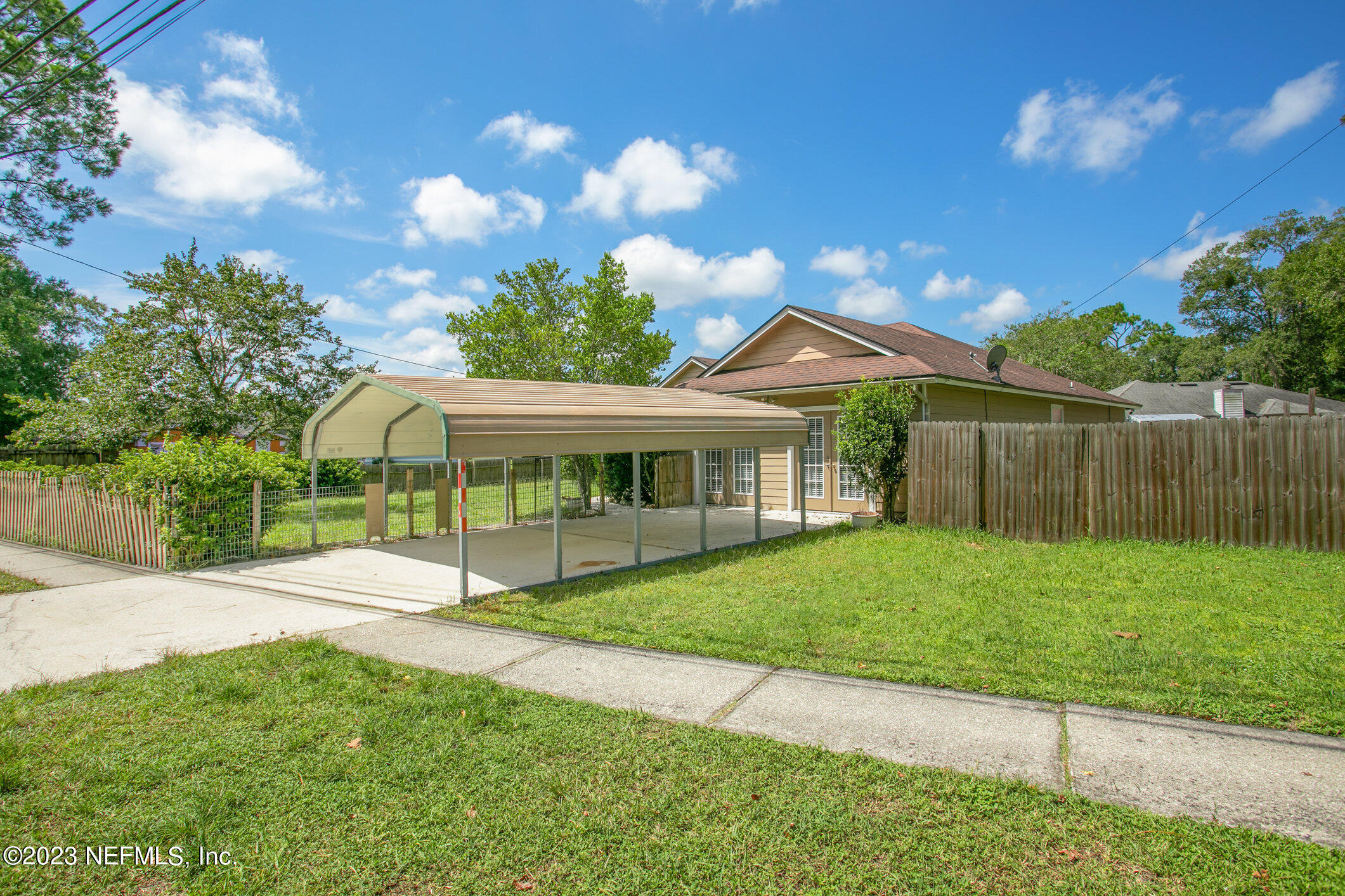 6650 Ricker Road Jacksonville, FL 32244 - Photo 40 of 41 a view of a house with a backyard