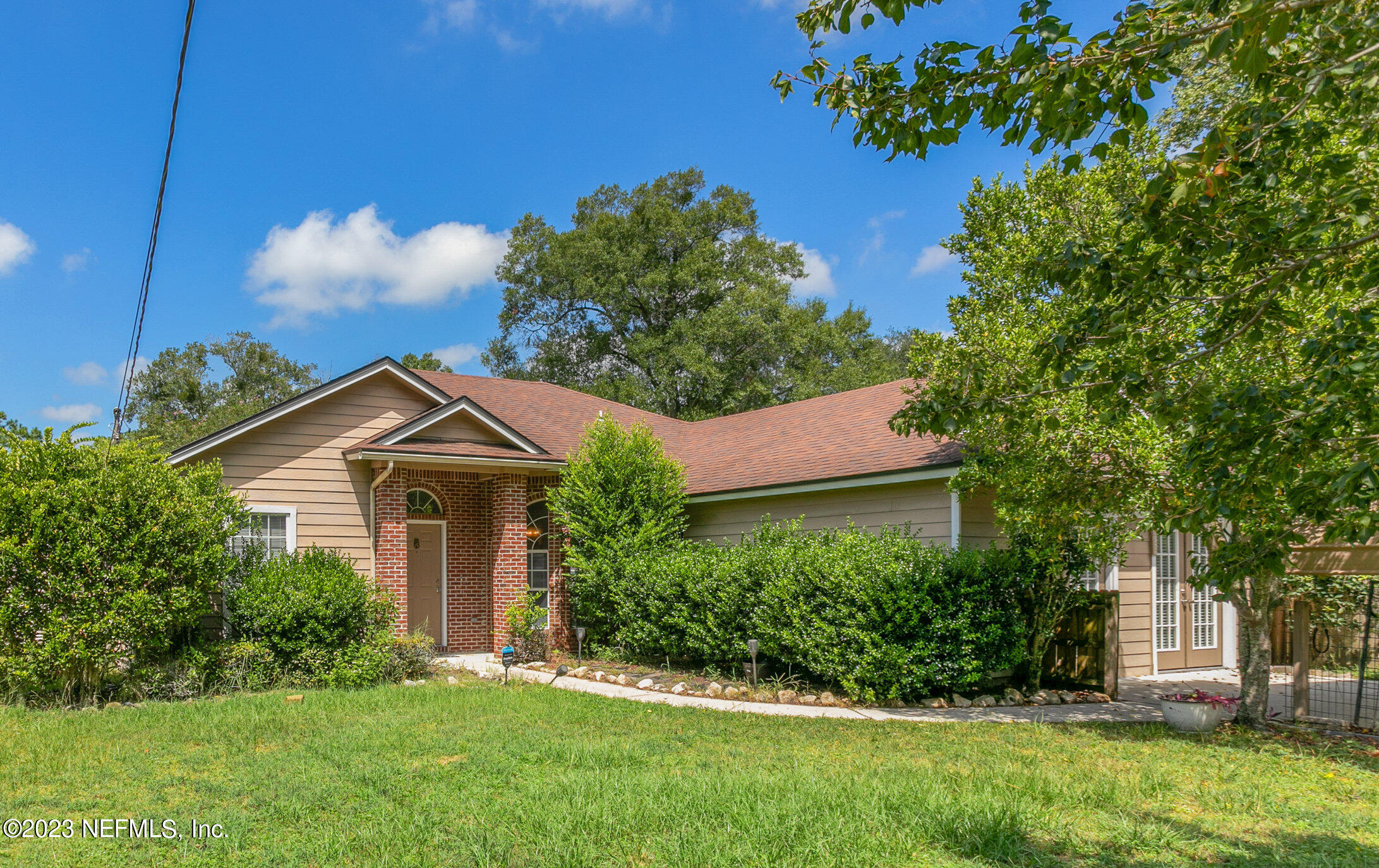 6650 Ricker Road Jacksonville, FL 32244 - Photo 41 of 41 a front view of a house with a yard