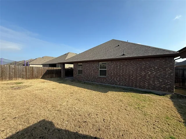 a white bath tub sitting in a bedroom
