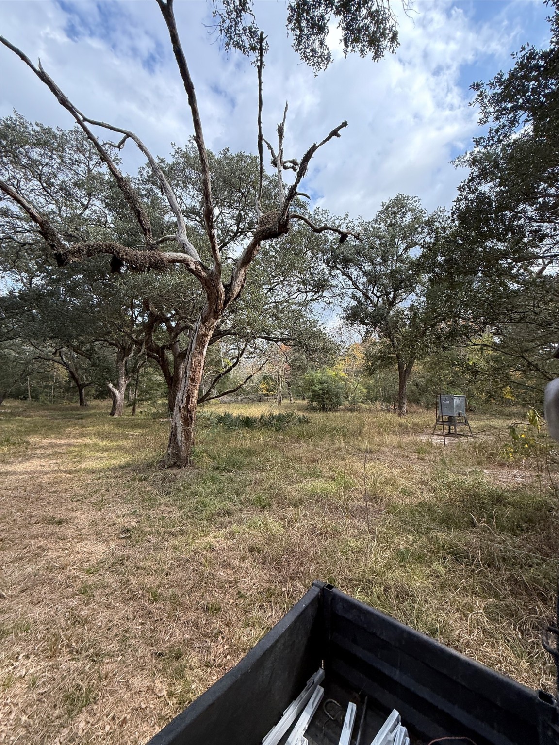 0 Fm-1459 Sweeny, TX 77480 - Photo 18 of 32 a view of roof with wooden fence and floor