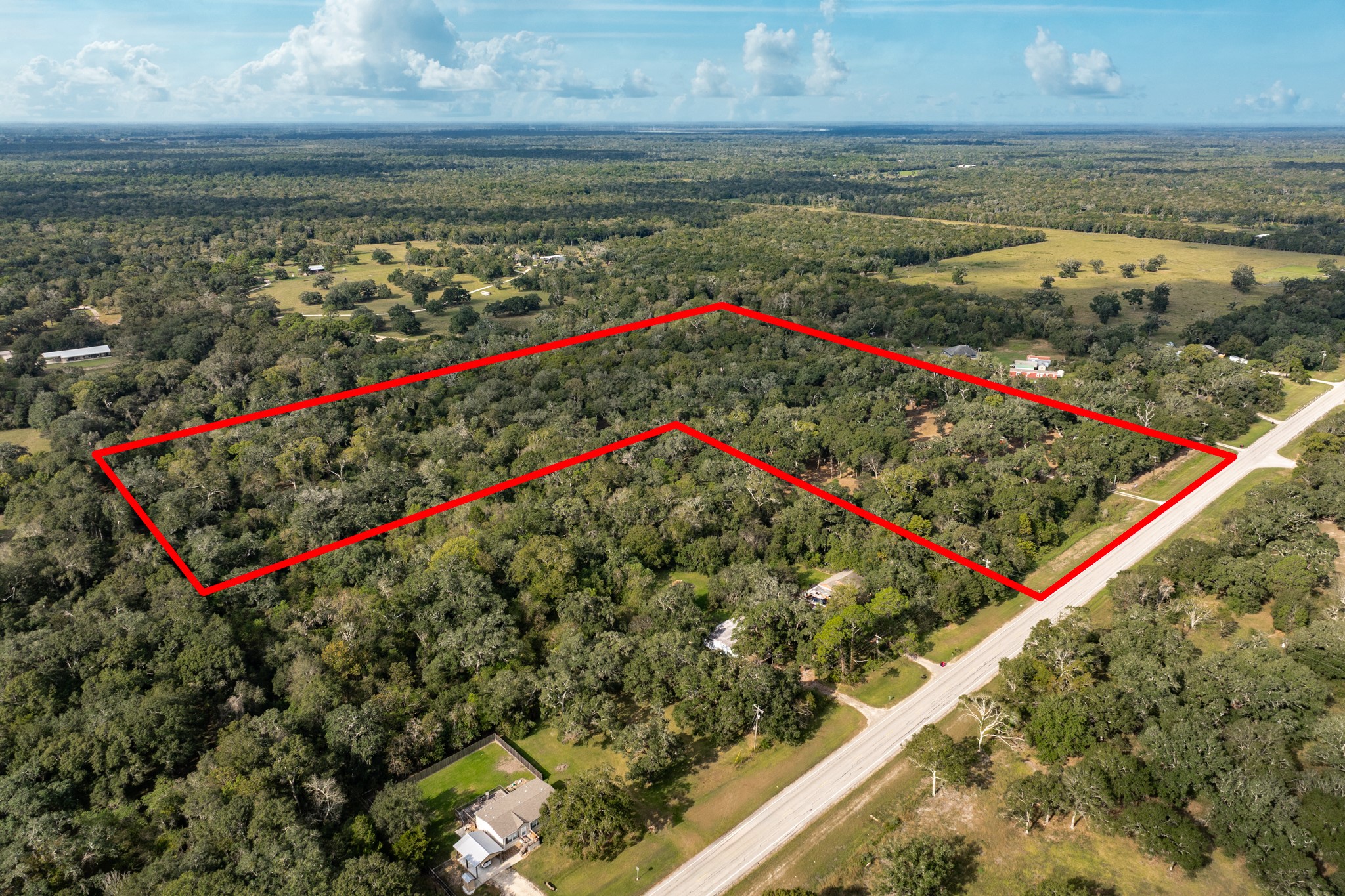 0 Fm-1459 Sweeny, TX 77480 - Photo 6 of 32 a view of a floor to ceiling window and an ocean