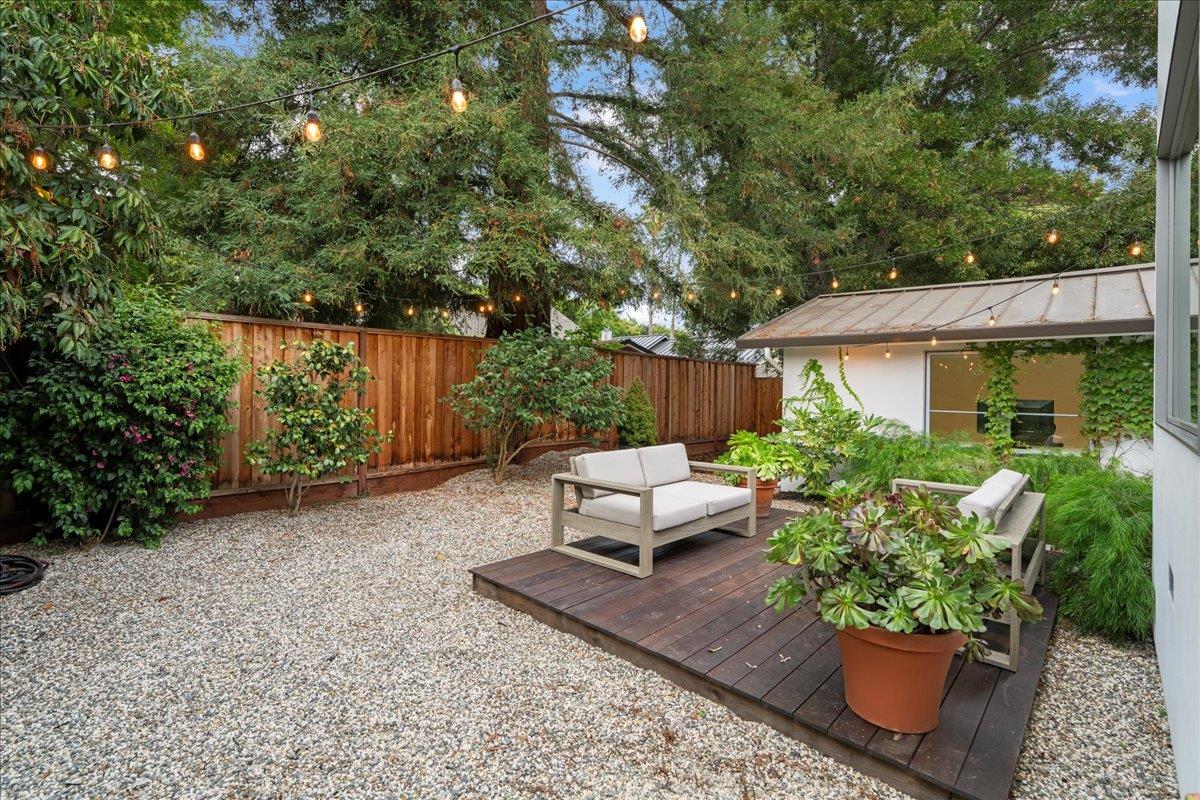 335 Middlefield Road Palo Alto, CA 94301 - Photo 15 of 38 a view of a house with patio and garden