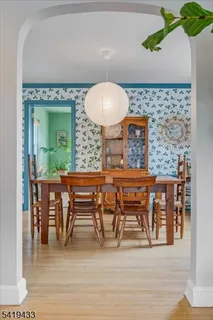 a workspace with furniture and a potted plant