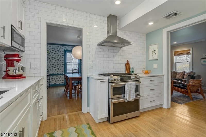 4 Rynda Road Maplewood, NJ 07040 - Photo 17 of 34 a kitchen with stove and cabinets