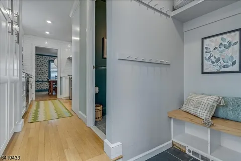 a view of a hallway with a furniture