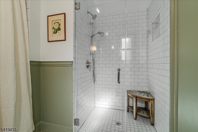 4 Rynda Road Maplewood, NJ 07040 - Photo 25 of 34 a bathroom with a shower