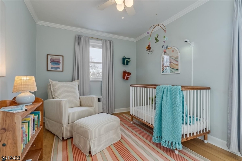4 Rynda Road Maplewood, NJ 07040 - Photo 27 of 34 a living room with furniture and a window