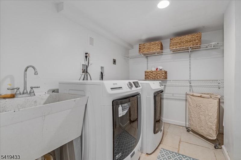 4 Rynda Road Maplewood, NJ 07040 - Photo 30 of 34 a utility room with sink dryer and washer