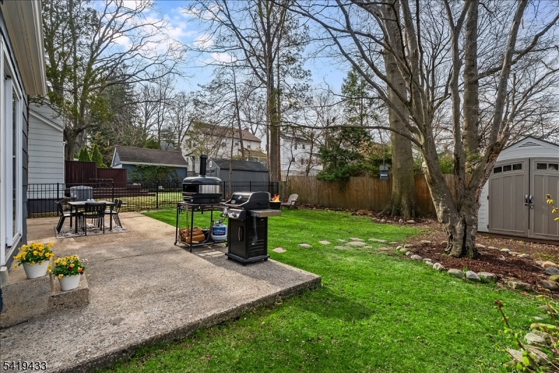 4 Rynda Road Maplewood, NJ 07040 - Photo 31 of 34 a view of a backyard with sitting area