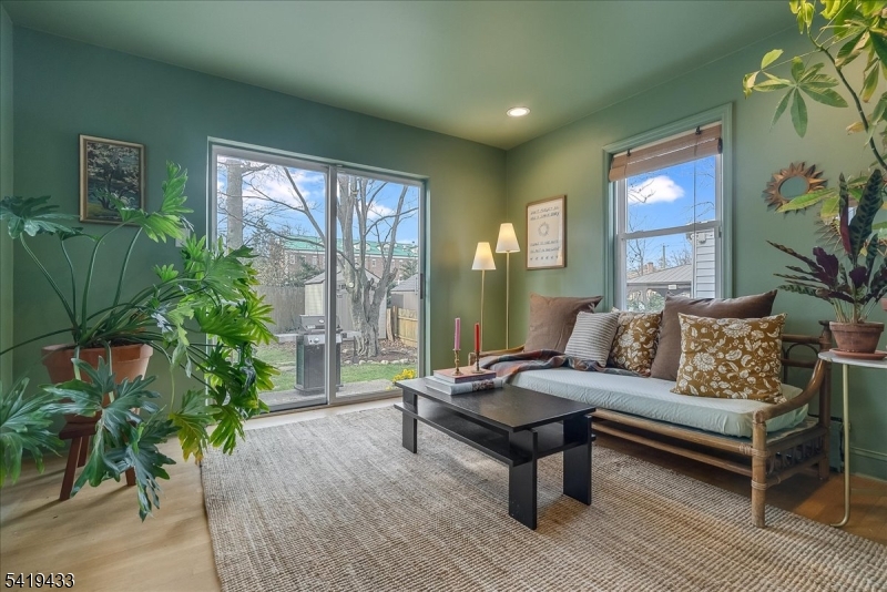 4 Rynda Road Maplewood, NJ 07040 - Photo 8 of 34 a living room with furniture and a potted plant