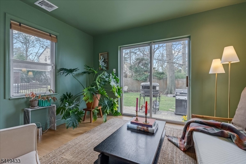 4 Rynda Road Maplewood, NJ 07040 - Photo 9 of 34 a work room with furniture and a potted plant