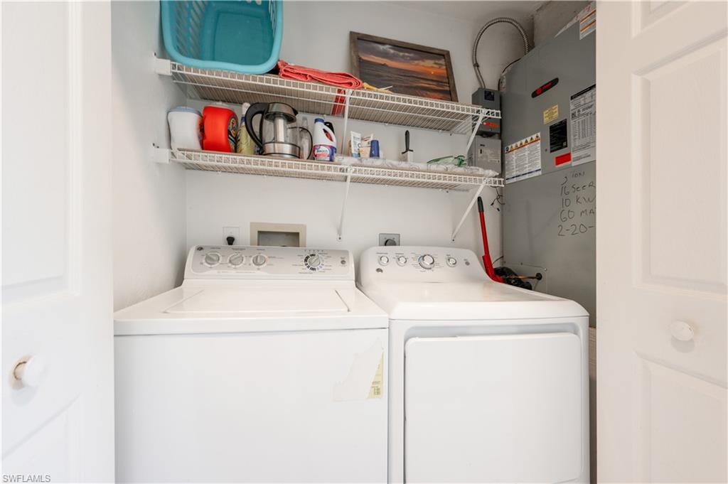 367 Dover Place, Unit 1002 Naples, FL 34104 - Photo 23 of 31 a utility room with dryer and washer