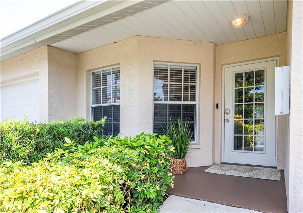367 Dover Place, Unit 1002 Naples, FL 34104 - Photo 26 of 31 front view of a house