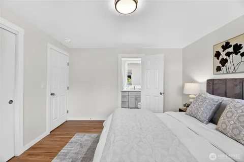 a bed room with a bed and a couch