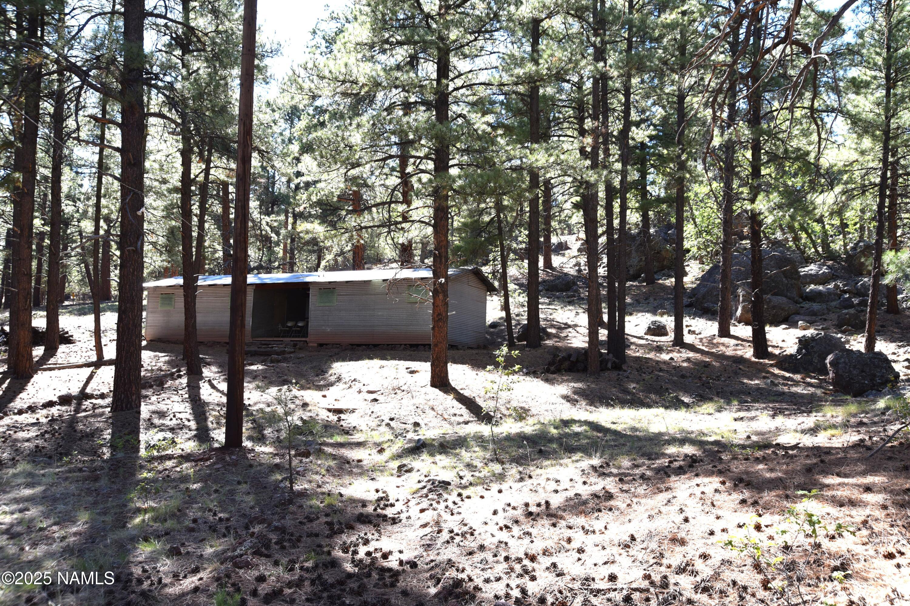 7145 East 4h Club Camp Road Williams, AZ 86046 - Photo 14 of 35 a view of snow on the side of a road