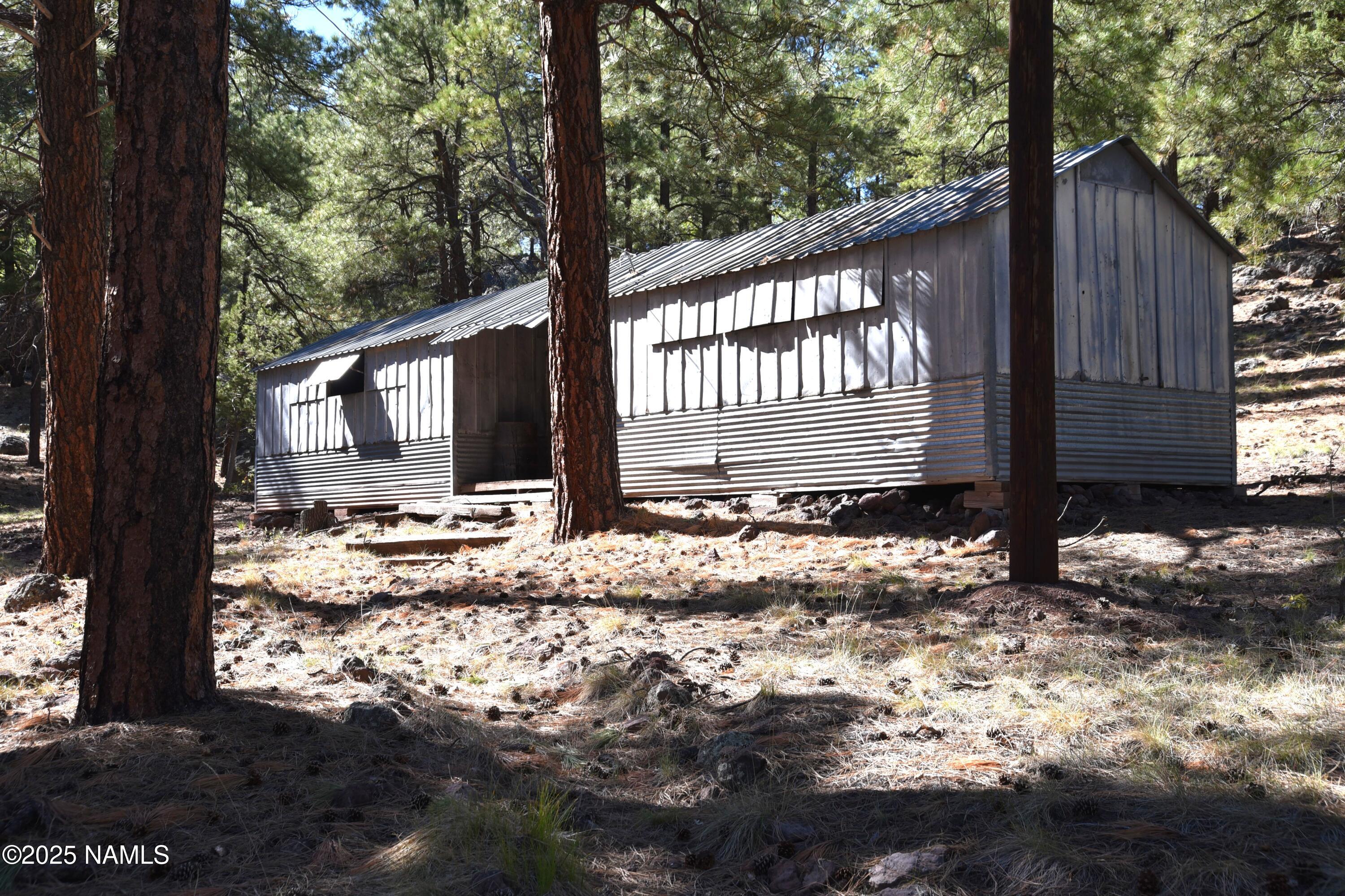 7145 East 4h Club Camp Road Williams, AZ 86046 - Photo 18 of 35 a view of a back yard of the house