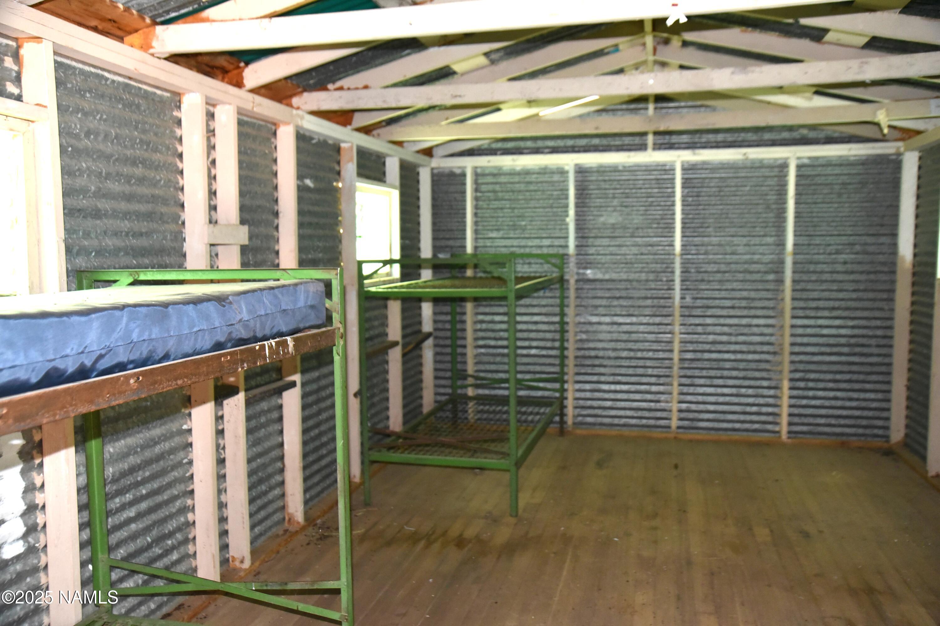 7145 East 4h Club Camp Road Williams, AZ 86046 - Photo 19 of 35 a view of a door with a door and wooden floor