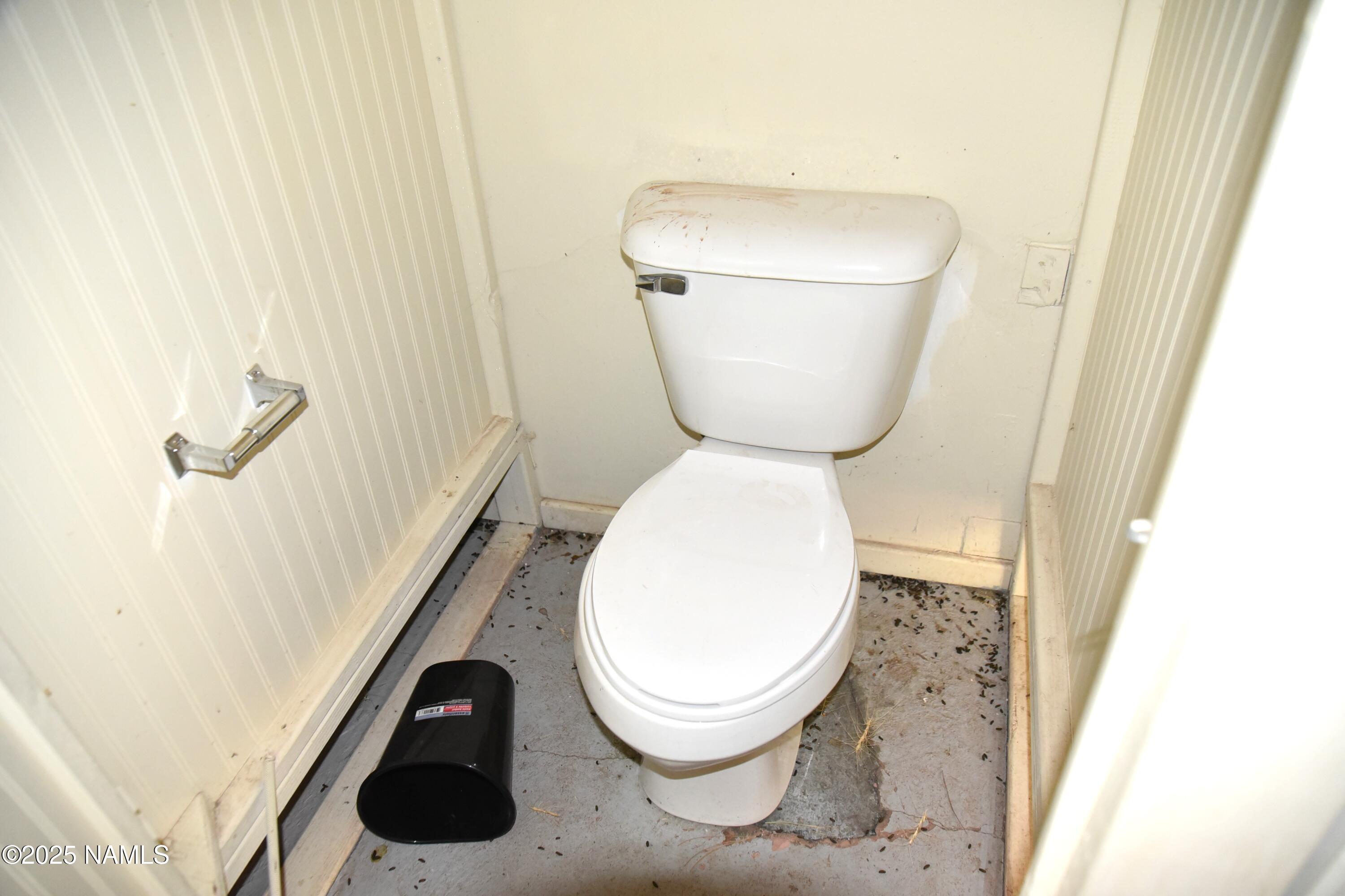 7145 East 4h Club Camp Road Williams, AZ 86046 - Photo 22 of 35 a close view of a toilet in a bathroom