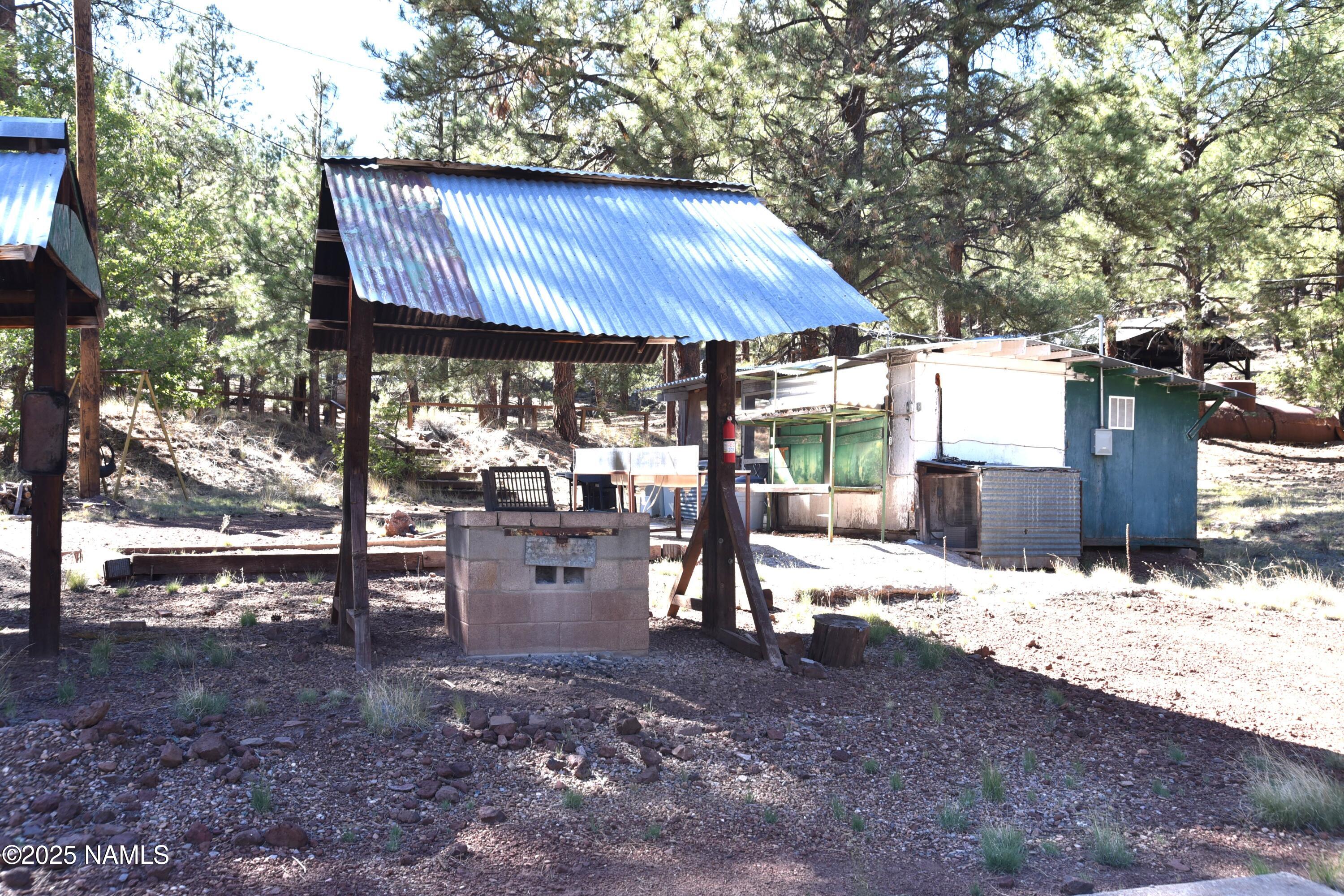 7145 East 4h Club Camp Road Williams, AZ 86046 - Photo 30 of 35 a view of a outdoor space and patio