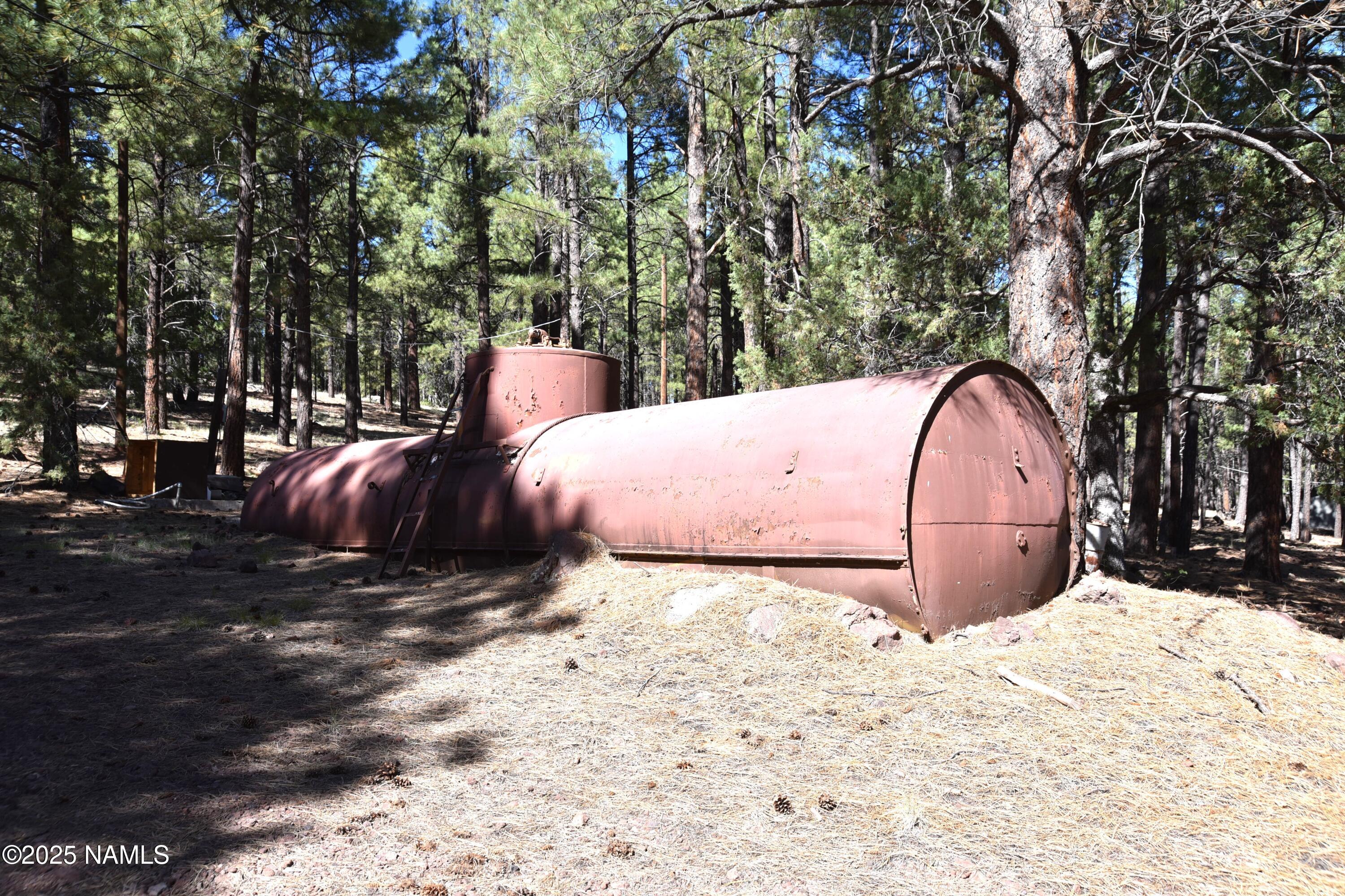 7145 East 4h Club Camp Road Williams, AZ 86046 - Photo 33 of 35 a outdoor space with lots of trees