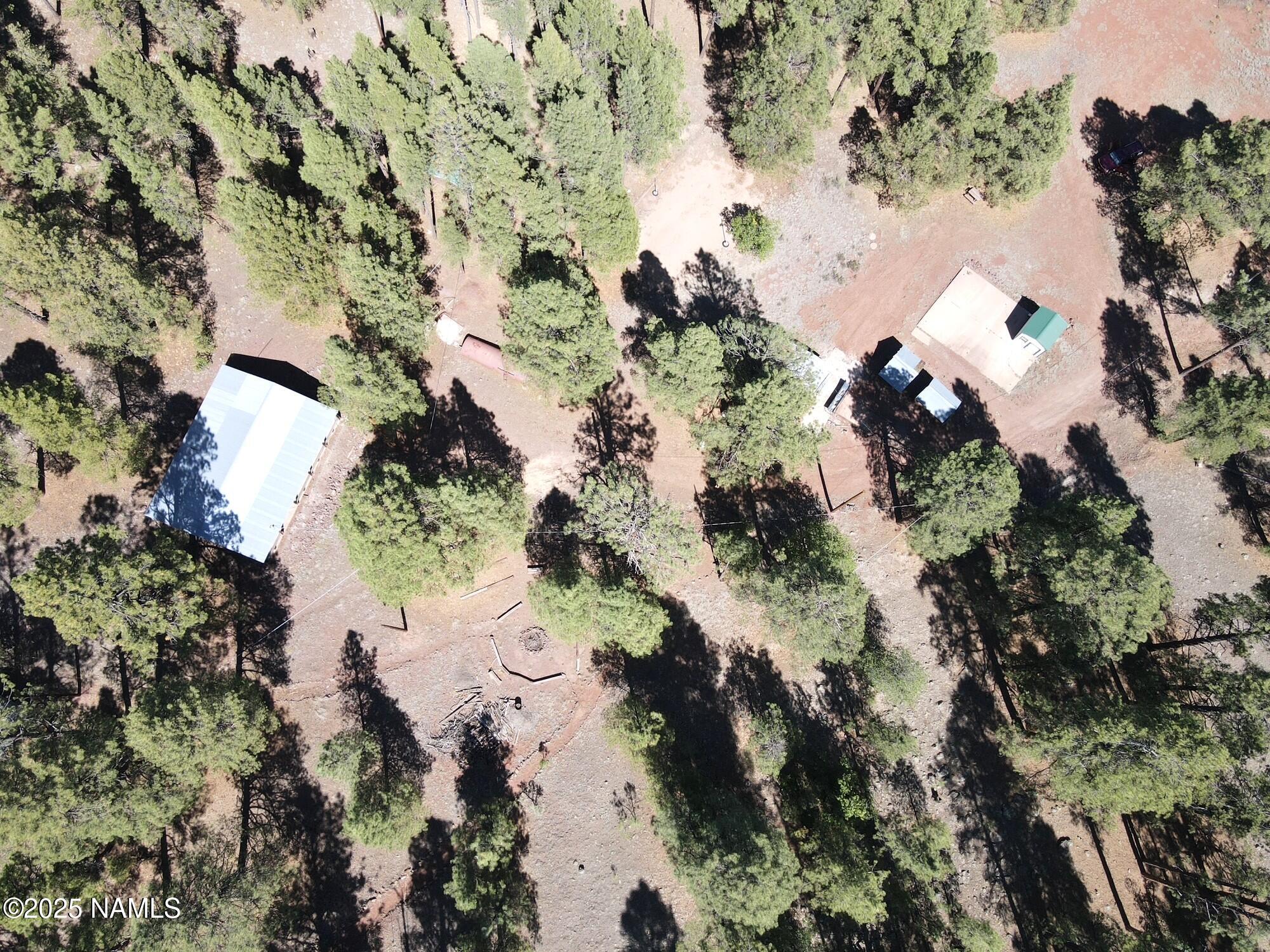 7145 East 4h Club Camp Road Williams, AZ 86046 - Photo 6 of 35 an aerial view of a house with a yard