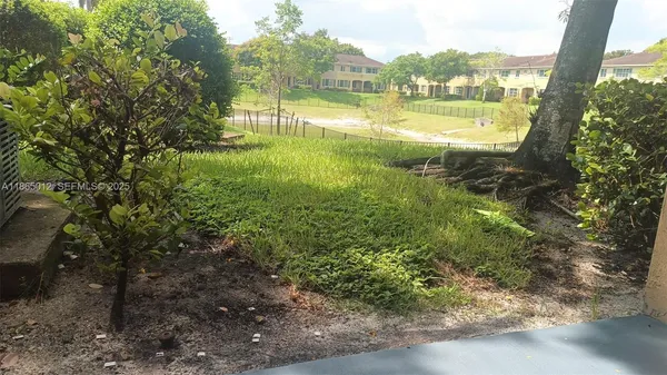 a view of an outdoor space and a yard