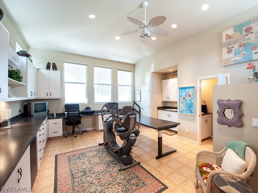 790 Beach Road Sanibel, FL 33957 - Photo 26 of 35 a living room with furniture a rug and a large window