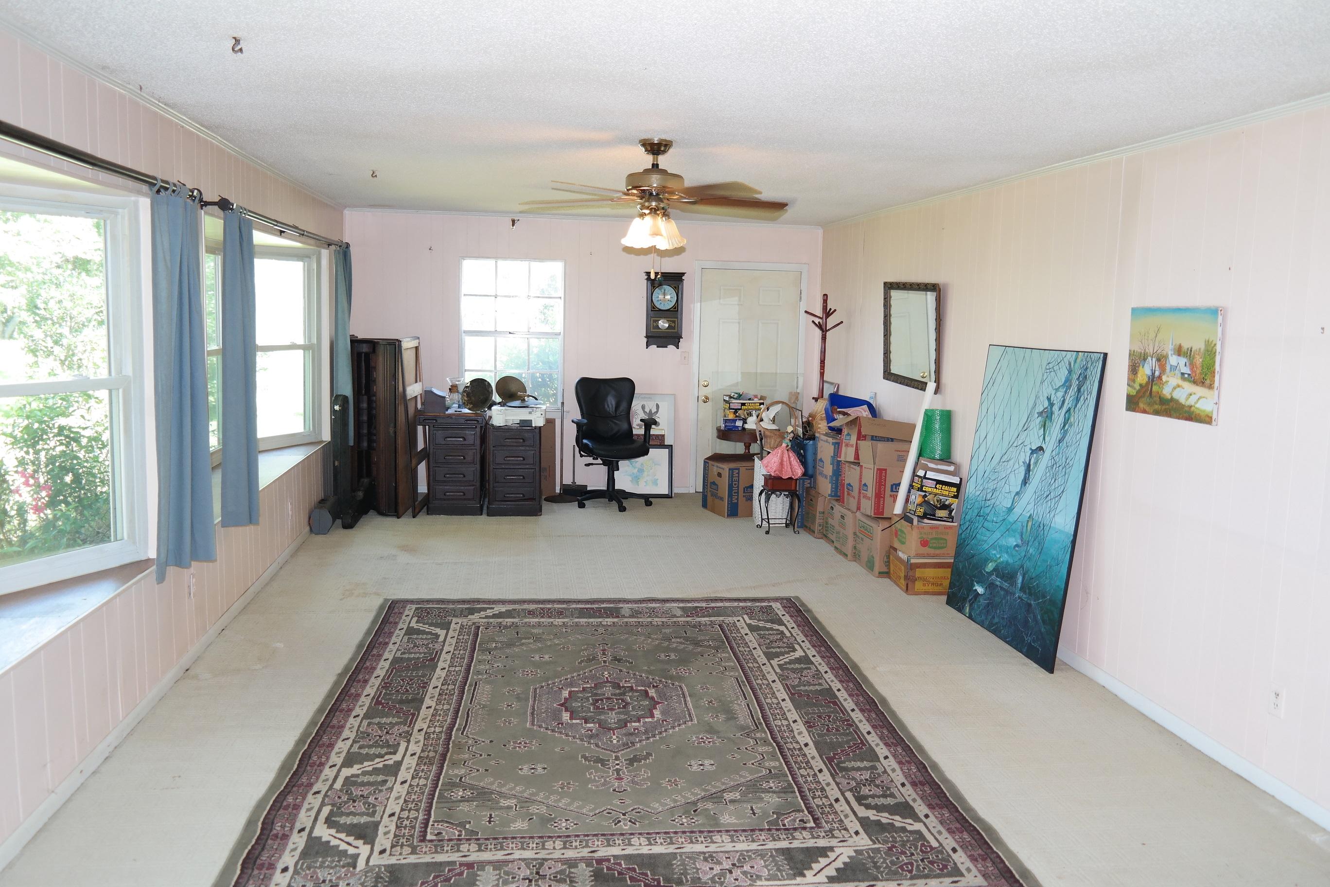 1824 Bay Grove Road Freeport, FL 32439 - Photo 17 of 51 a living room with furniture and a rug