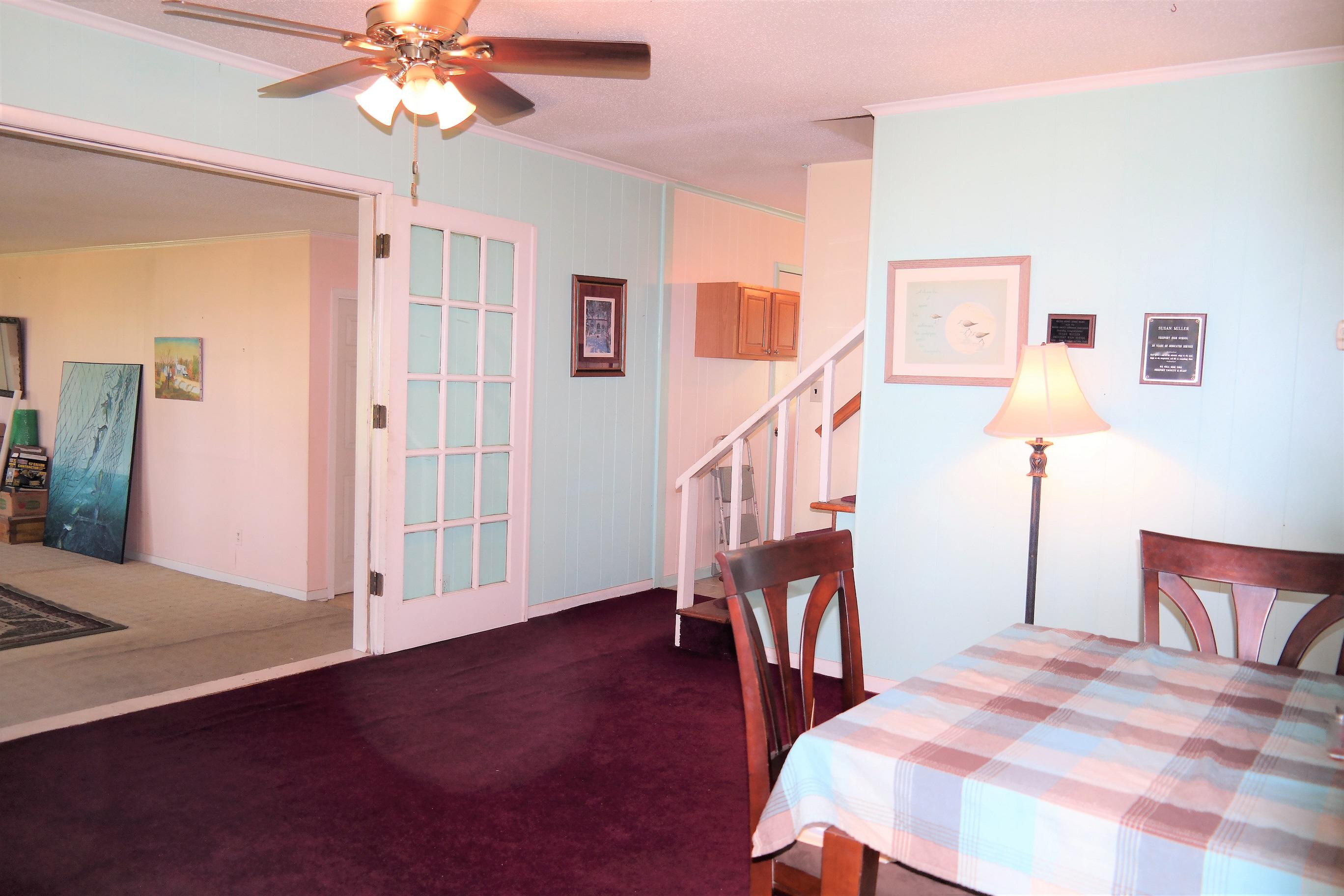 1824 Bay Grove Road Freeport, FL 32439 - Photo 19 of 51 a bedroom with furniture and a wooden floor
