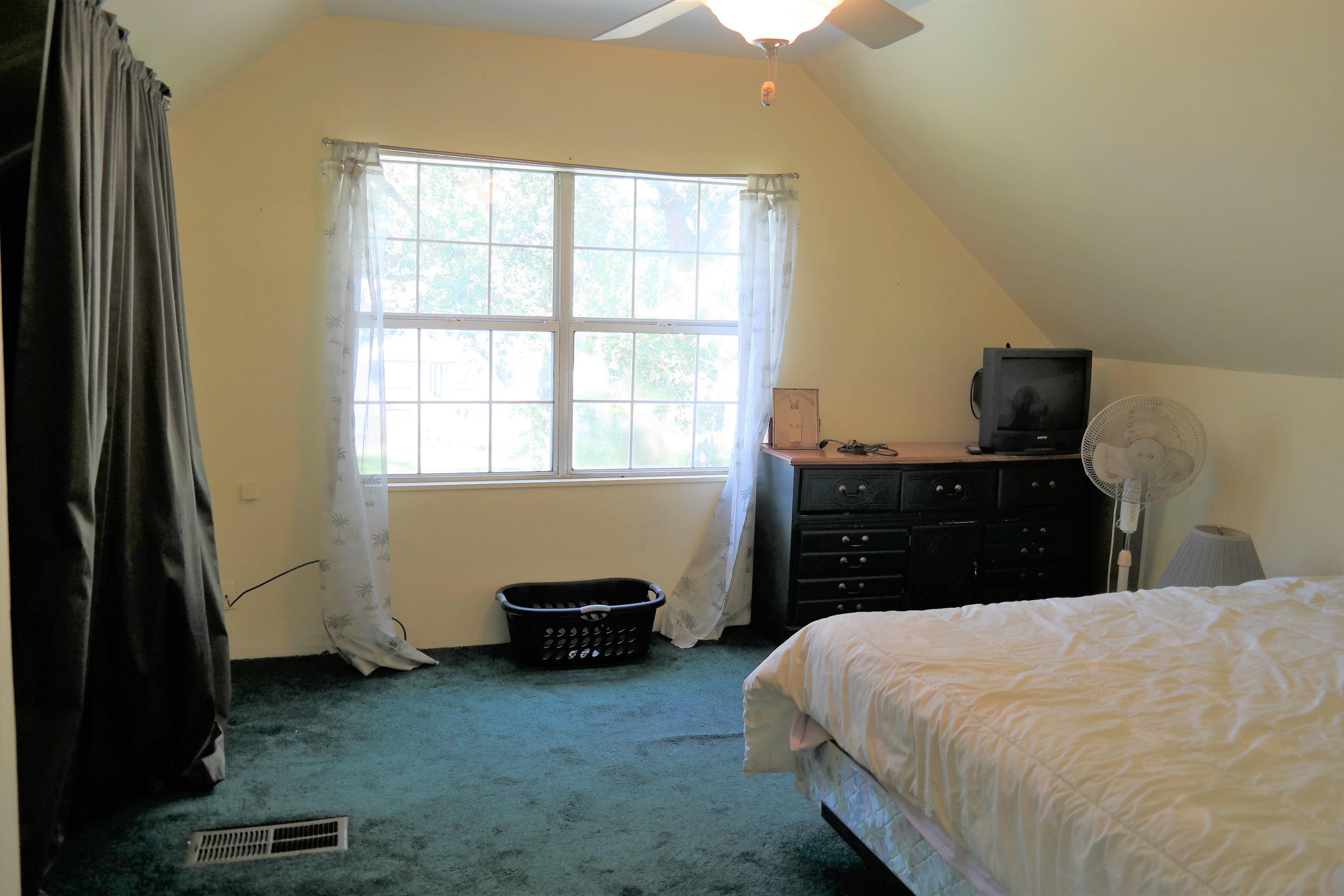 1824 Bay Grove Road Freeport, FL 32439 - Photo 29 of 51 a bedroom with a bed and a window