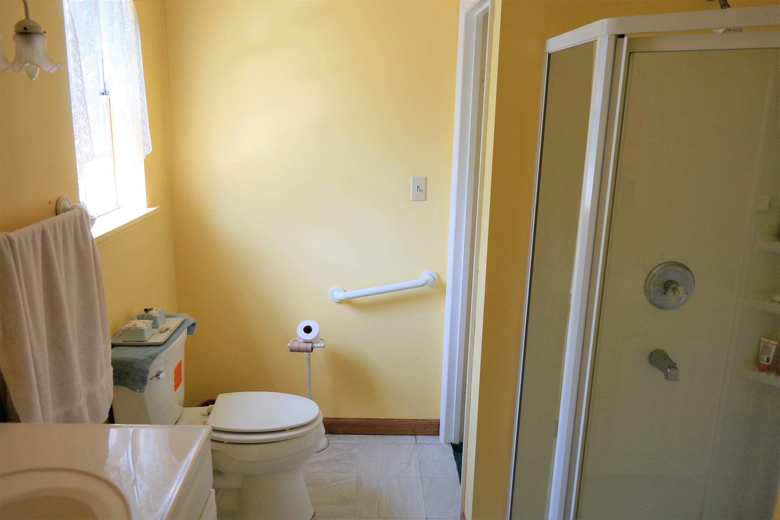 1824 Bay Grove Road Freeport, FL 32439 - Photo 32 of 51 a bathroom with a toilet and a shower