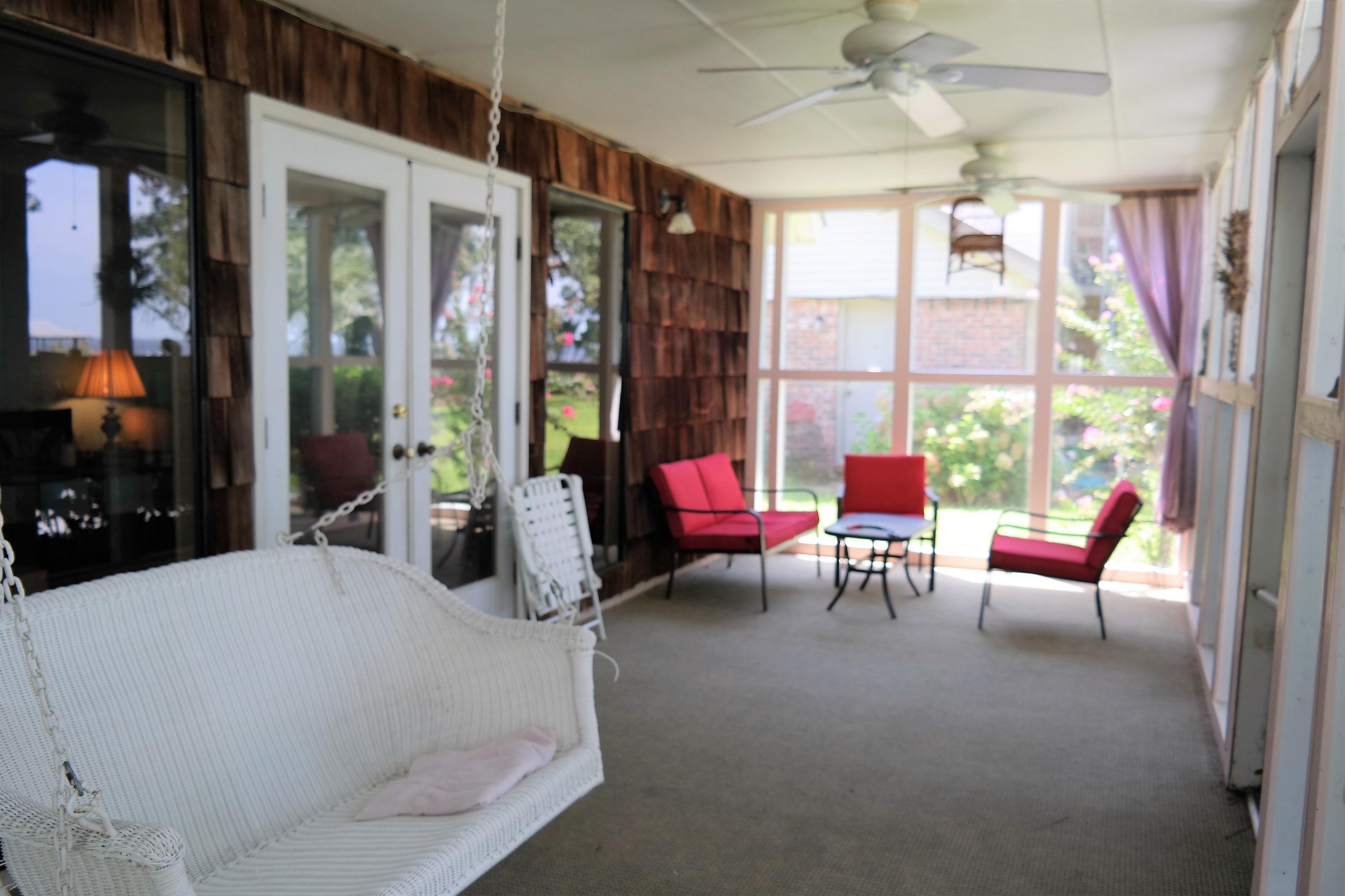 1824 Bay Grove Road Freeport, FL 32439 - Photo 36 of 51 a bedroom with furniture and a large window