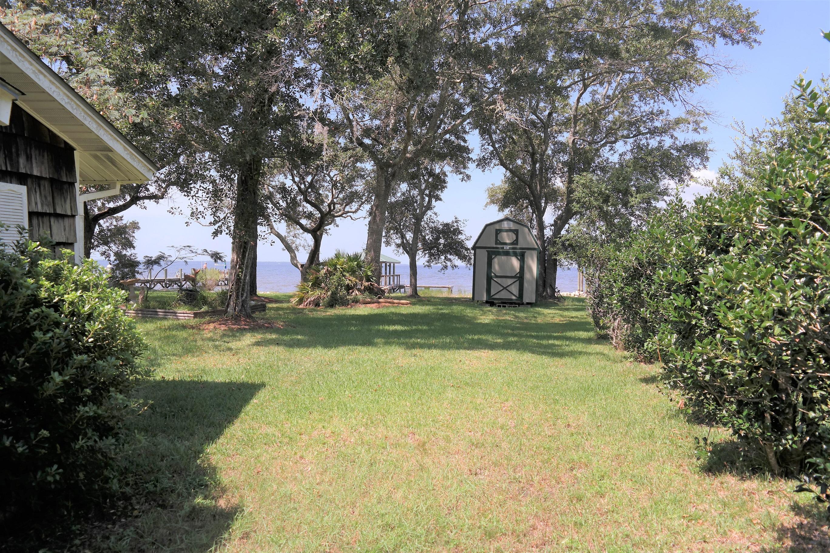 1824 Bay Grove Road Freeport, FL 32439 - Photo 49 of 51 a view of swimming pool with tree s