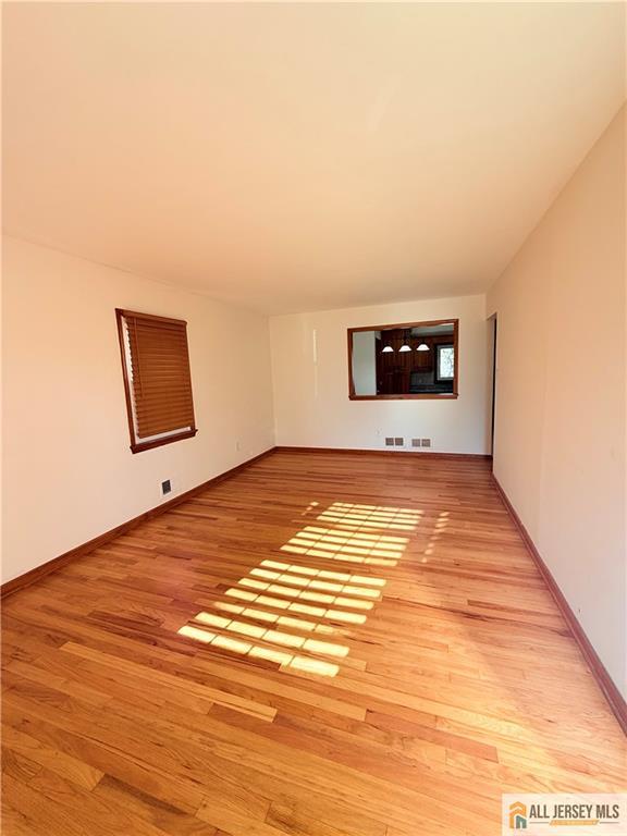 10 Hamilton Avenue Edison, NJ 08820 - Photo 3 of 10 a view of a room with an empty space