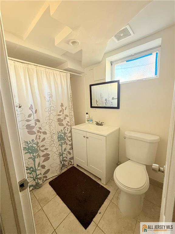 10 Hamilton Avenue Edison, NJ 08820 - Photo 10 of 10 a bathroom with a toilet and a shower