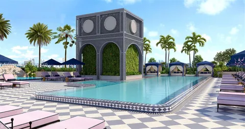 a view of swimming pool with sitting area