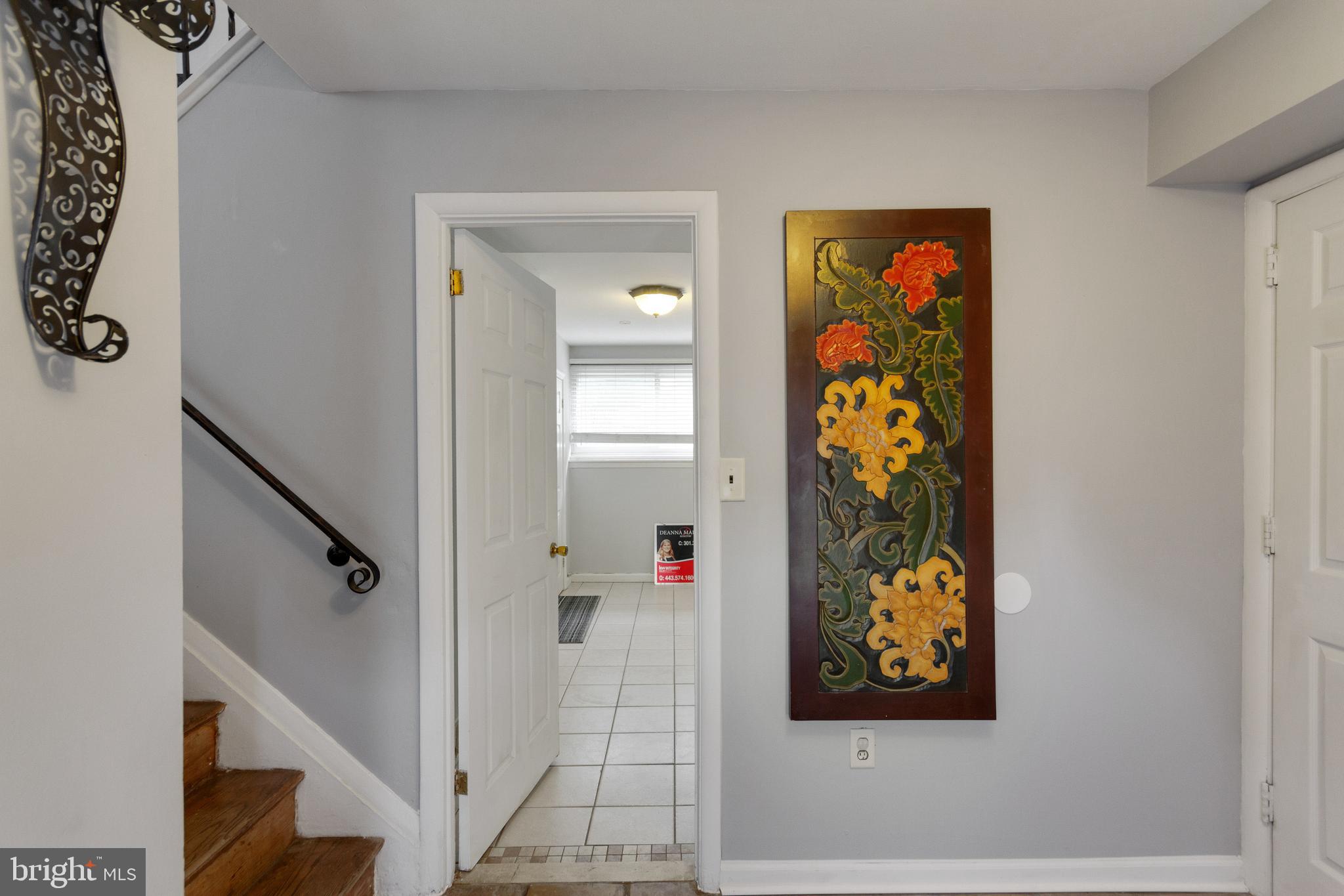 218 Ridgely Road Glen Burnie, MD 21061 - Photo 4 of 25 Open foyer/ 4th bdrm, family room & powder room