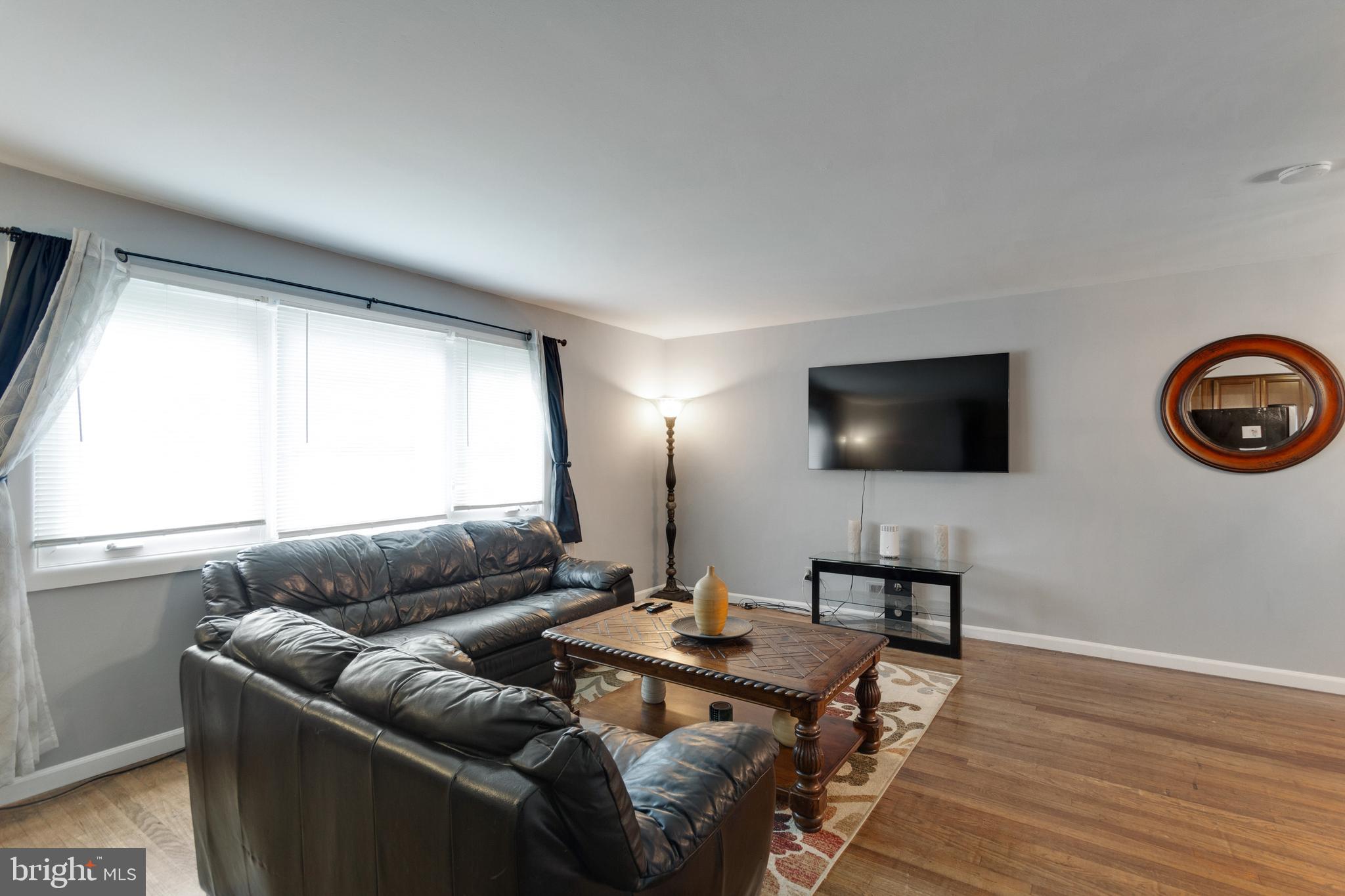 218 Ridgely Road Glen Burnie, MD 21061 - Photo 6 of 25 Living room - large front windows