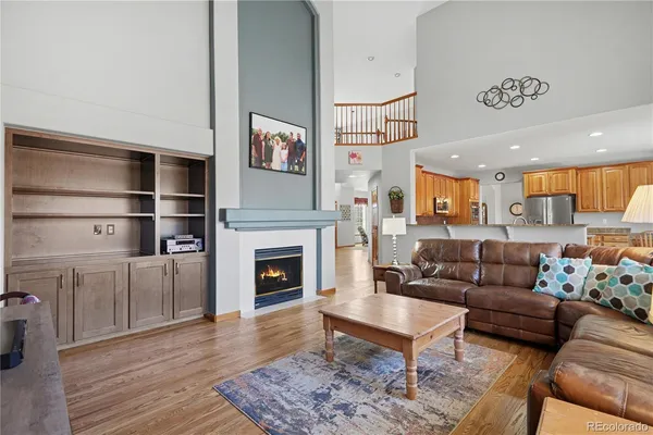 a living room with furniture or fireplace and a rug